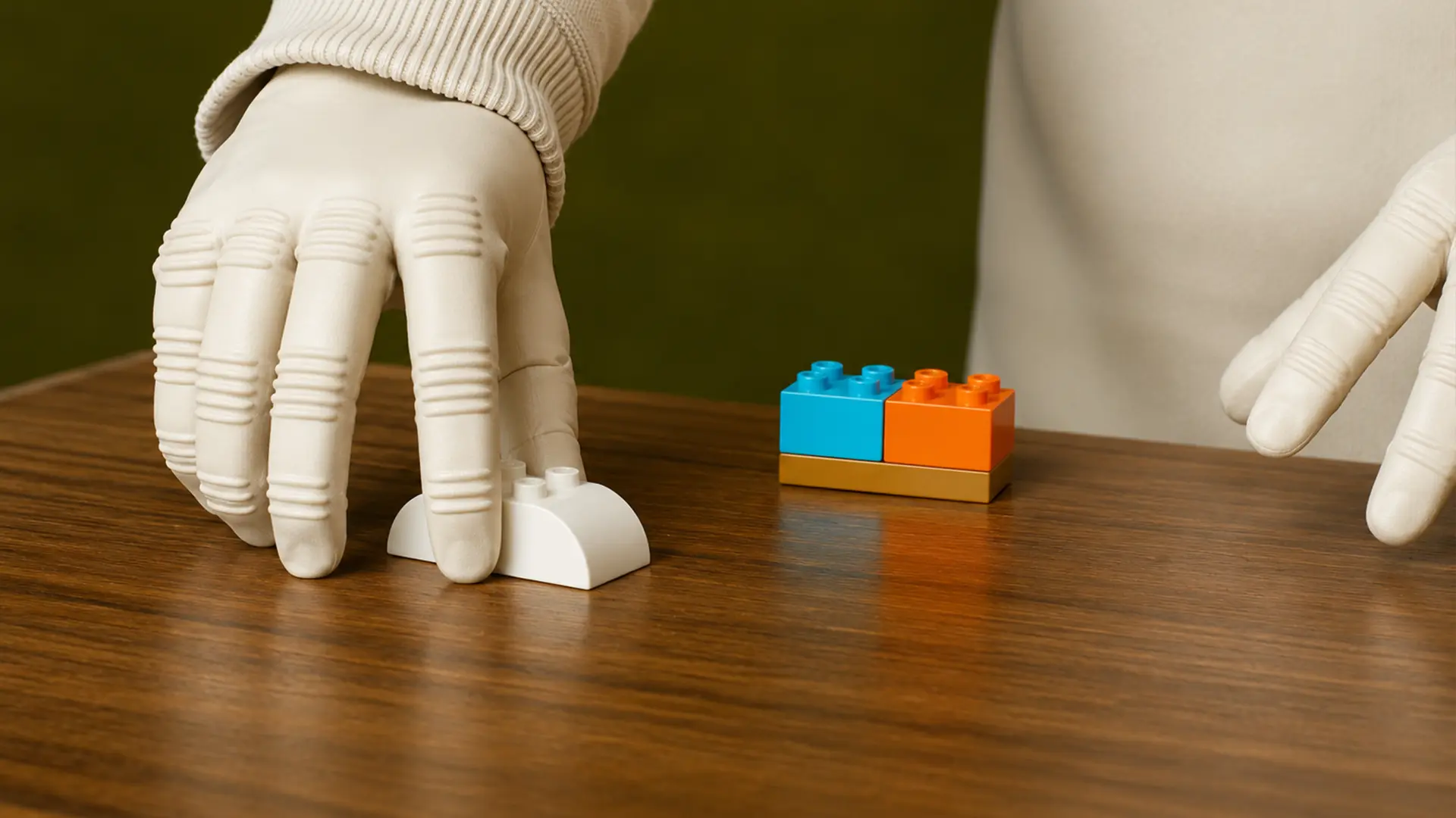 1X NEO hands building with Lego bricks