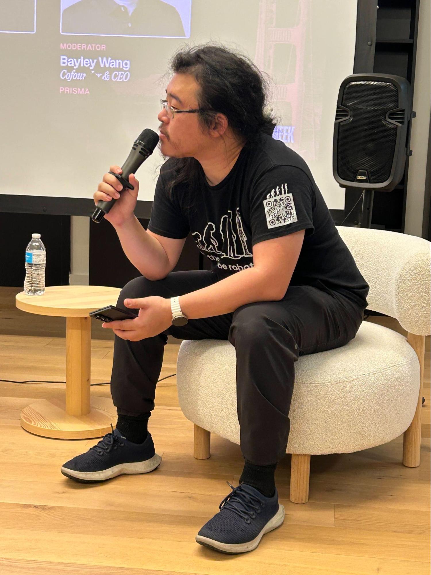 Bayley Wang, co-founder and CEO of PrismaX, moderates the RoboCon Physical AI Salon, Friday 10 October, Moonlake’s offices